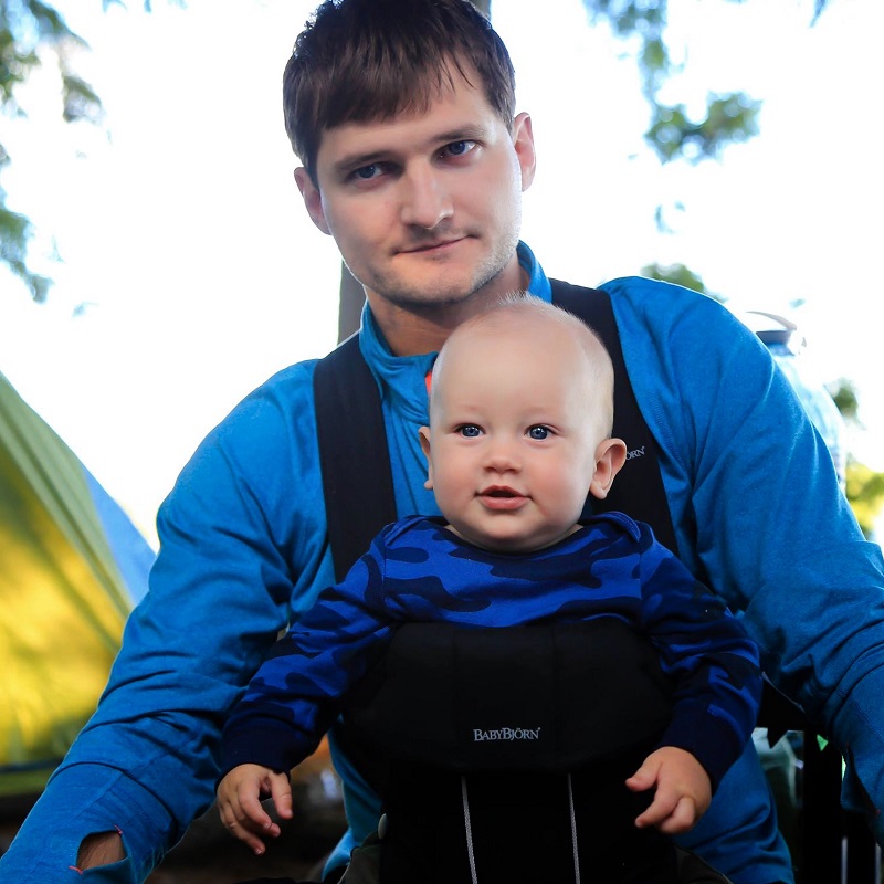 PerfectDayToPlay camping with a baby gear essentials Cosmos in a baby carrier