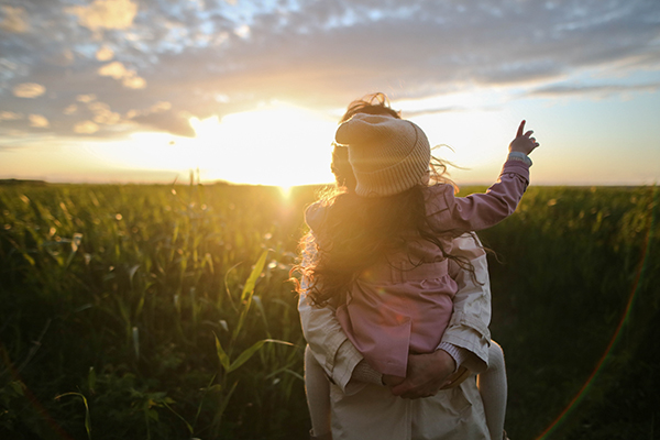 PerfectDayToPlay beautiful mother and daughter sunset in the field nature
