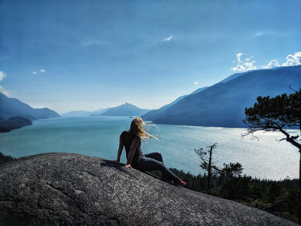 wind and the summer evening backdrop of Howe Sound as seen from Jurassic Ridge hiking trail in Murrin Provincial Park BC Canada next to Squamish