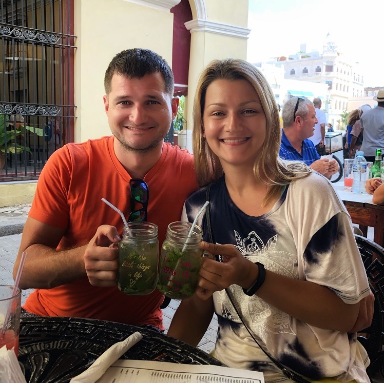 a couple drinking mojitos in Havana, Cuba