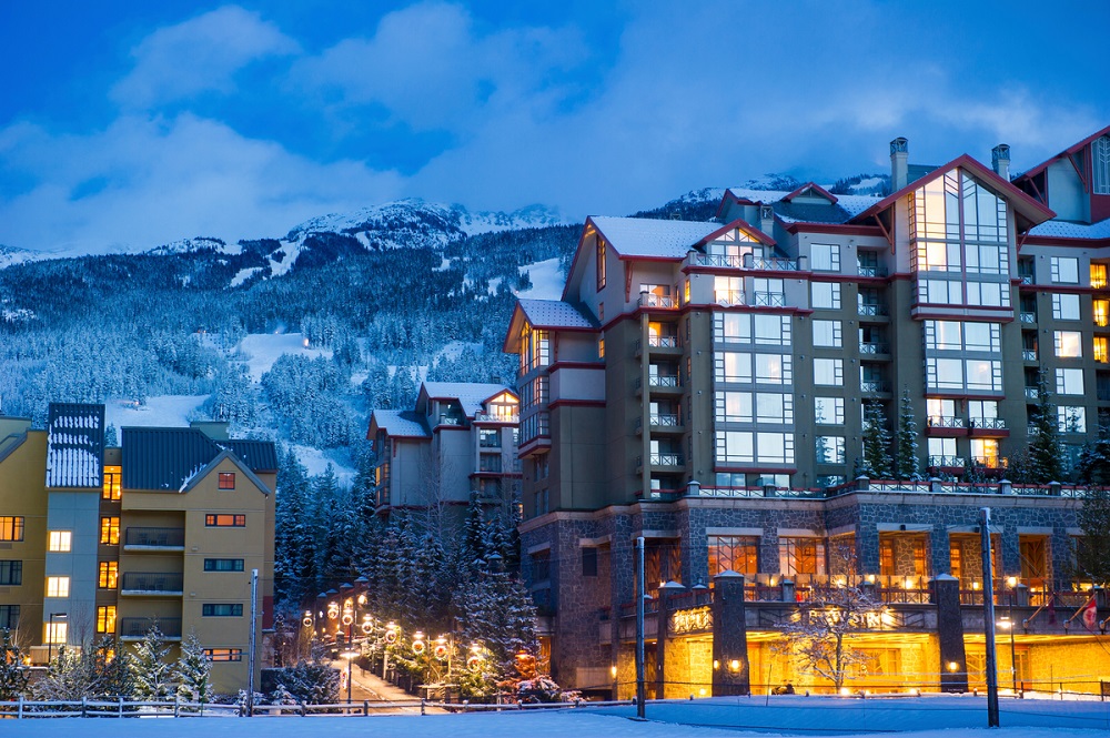 Whistler Village - Westin Hotel in front of the mountains in winter