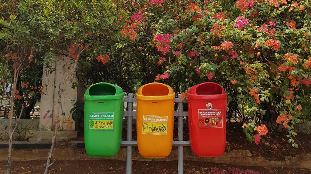 Colourful recycling bins - Reduce reuse recycle eco-friendly lifestyle