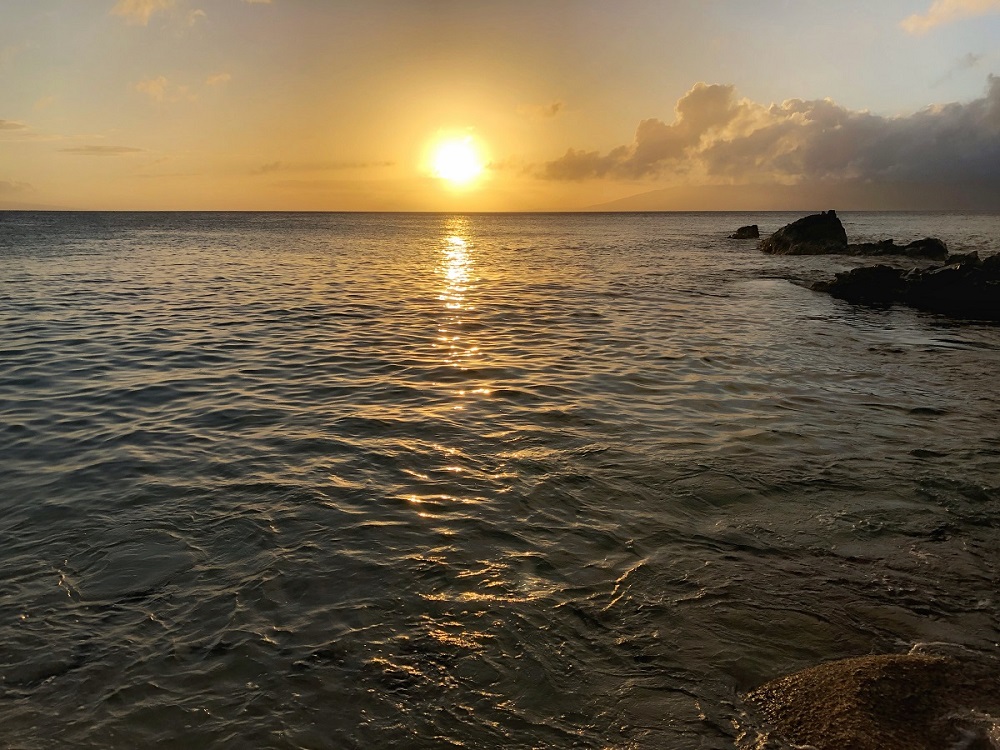 Maui Hawaii golden sunset seascape as seen from Kahana Sunset vacation rentals