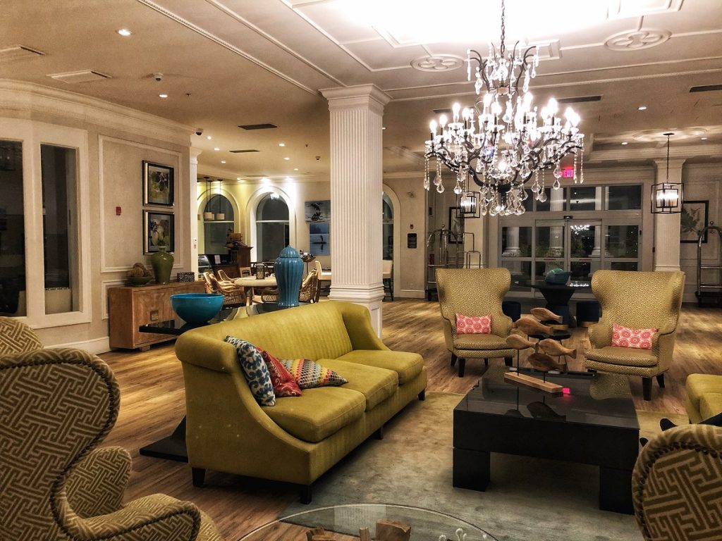 Prestige Oceanfront Resort lobby lounge and crystal chandelier