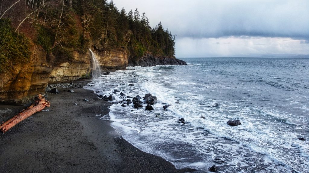 Juan De Fuca Marine Trail - Mystic Beach waterfalls at sunset - aerial view from a drone