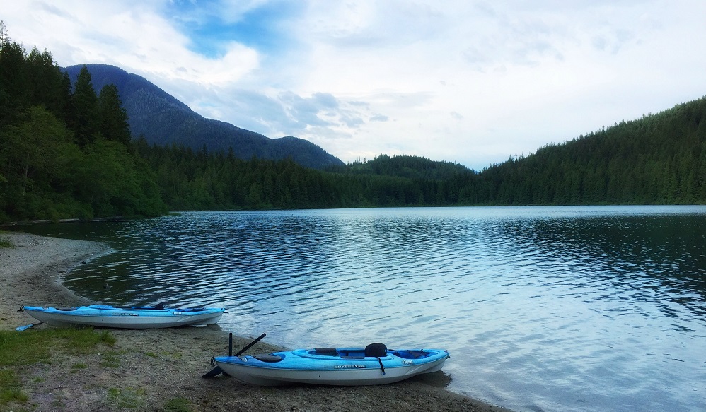 a pair of kayaks on lakeshore - Devils Lake hike near Mission BC