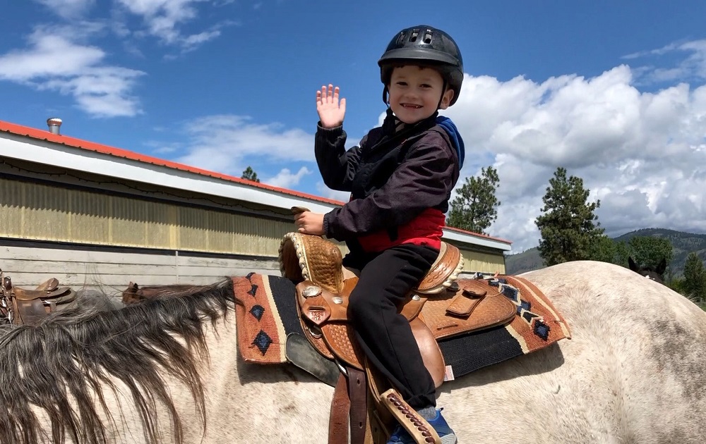 a child riding a horse at Erin Valley Riding Stables in Kamloops - fun things to do with kids