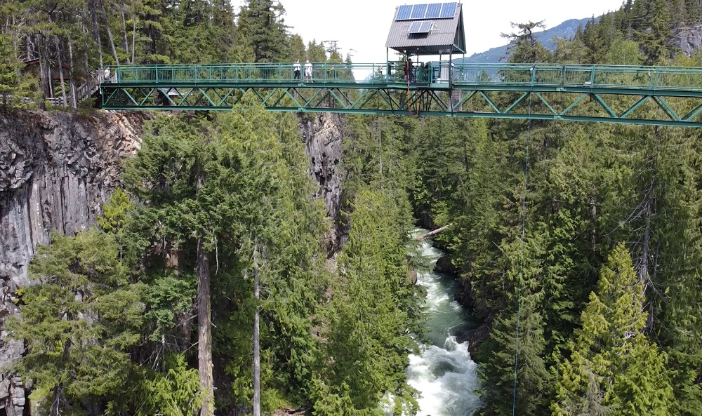 Whistler bungee bridge and Cheakamus river aerial view from a drone at 10m altitude