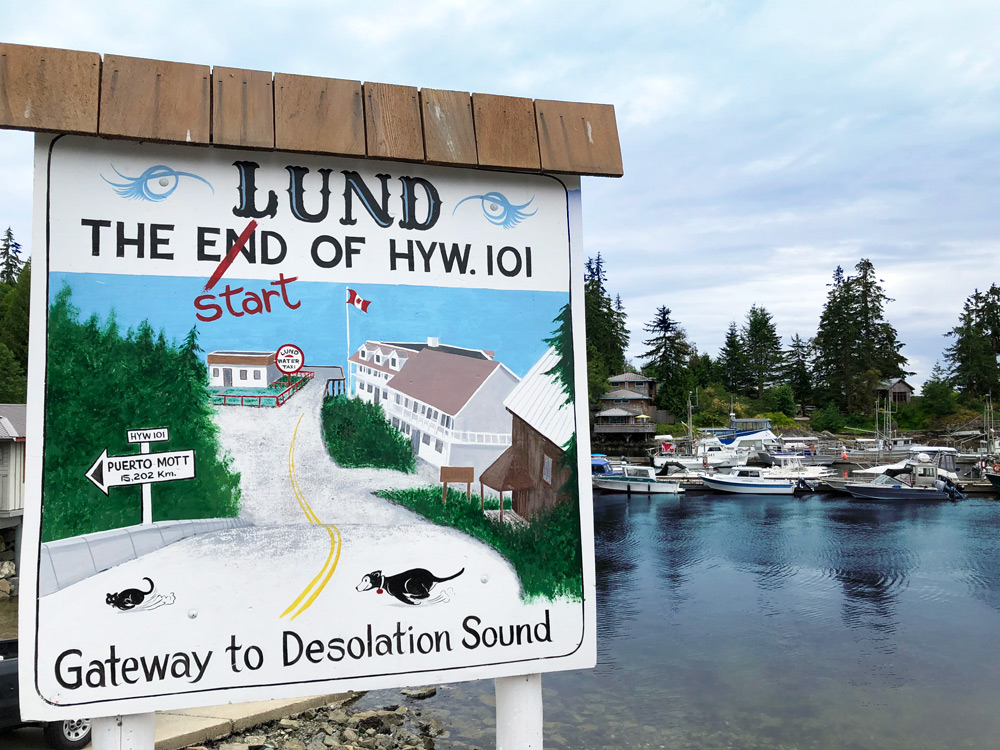 the end of the road sign next to Lund marina