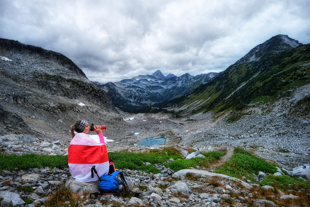 Mt Rohr view on the way to the summit - girl wrapped in Belarus white red and white flag