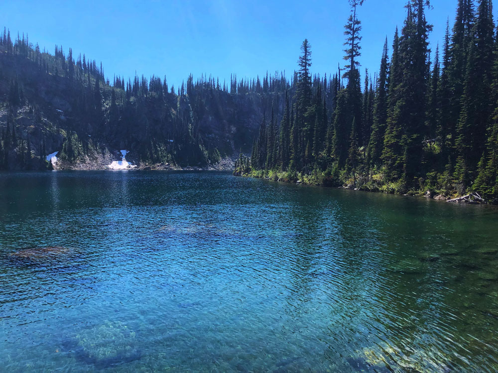 crystal clear blue and turquoise waters of Miller Lake, BC