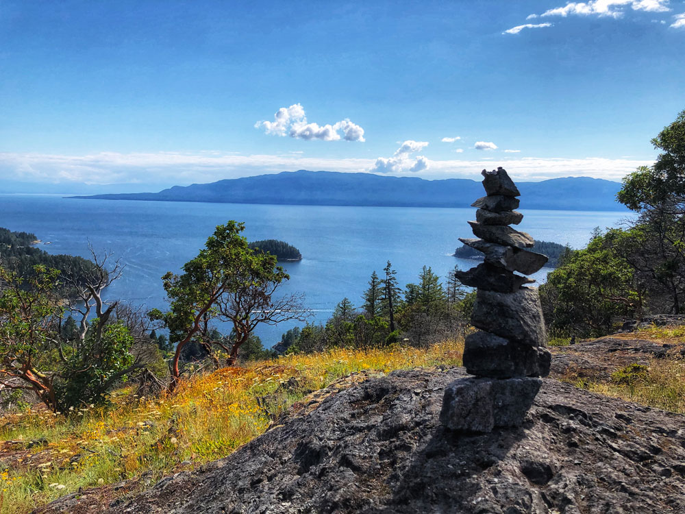 inukshuk and beautiful ocean view from Pender Hill trail, Malaspina Strait