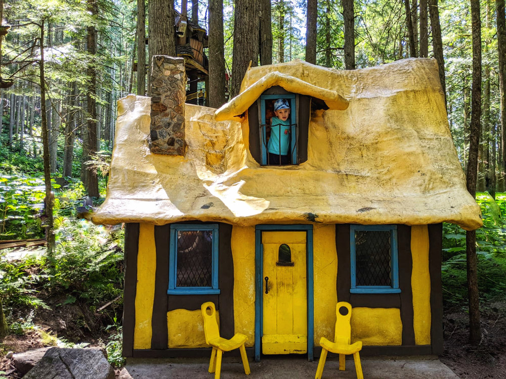 Yellow House at Enchanted Forest in Revelstoke outdoor places to visit with toddlers in British Columbia
