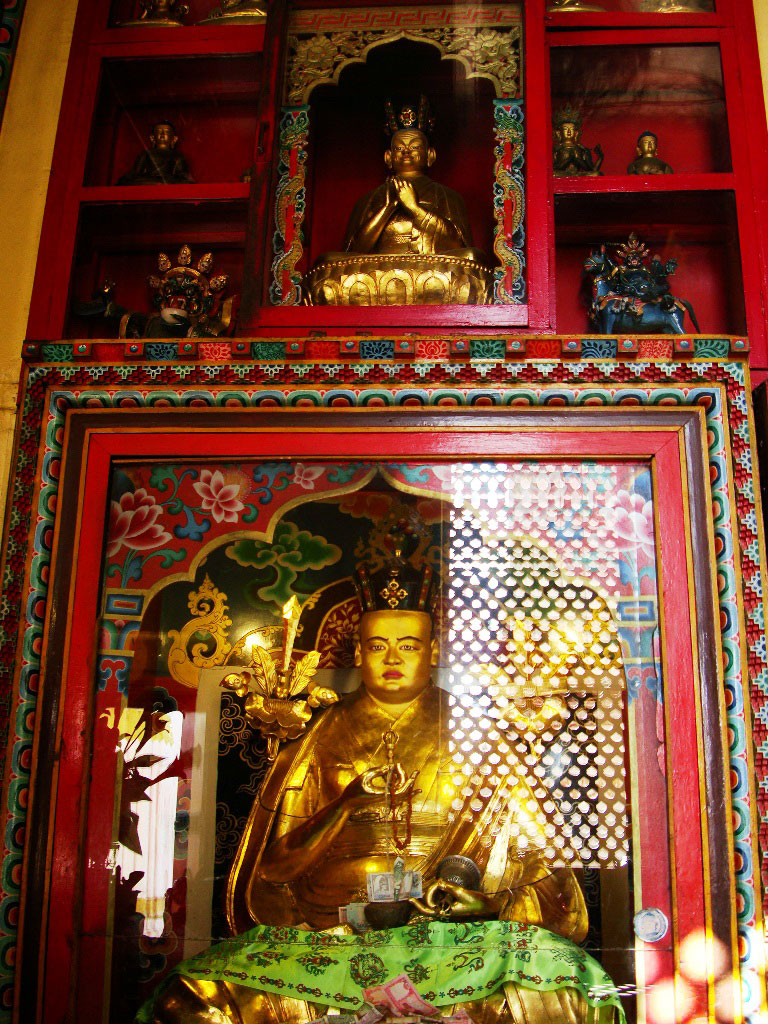 Inside Monkey Temple shrine - the golden statue of Buddha. Kathmandu, Nepal