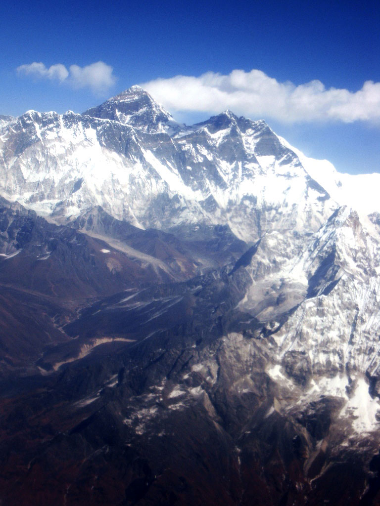 Mt. Everest Jomolungma mountain peak view as seen from a flyover tour in Kathmandu Nepal