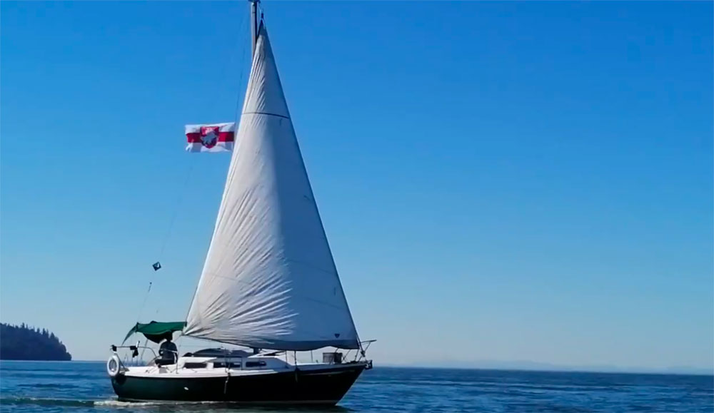 Belarus Freedom Flag with Pahonia at a yacht in Vancouver harbour, British Columbia, Canada