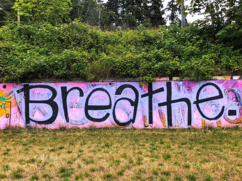 graffiti modern urban street art near Willingdon Beach Park in Powell River, British Columbia Canada - Breathe