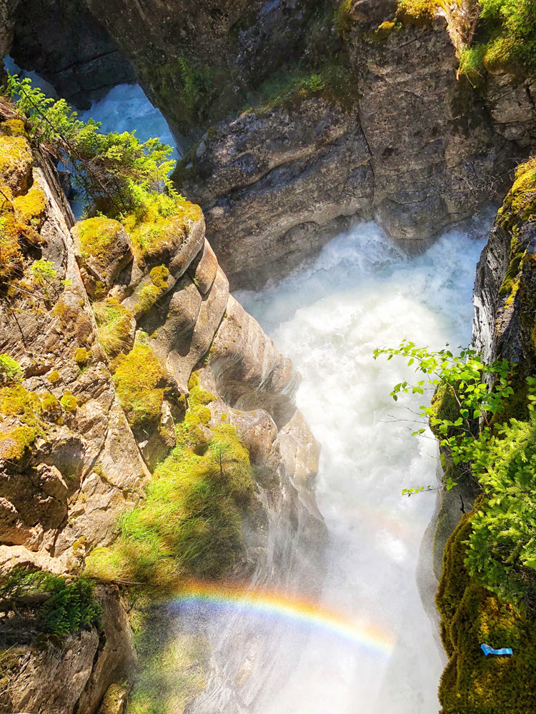 Maligne Canyon Jasper AB hike - waterfalls creating double rainbows